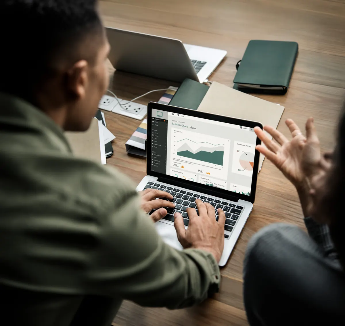 Marketer reviewing campaign performance on a laptop
